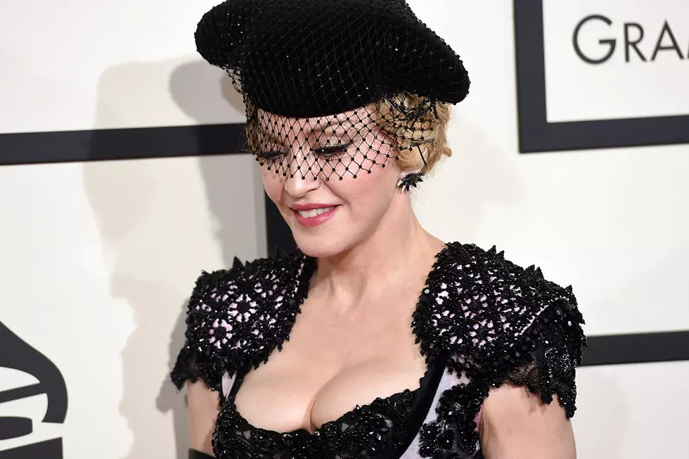 Madonna Collects Damages From Article That Threatened Daughters