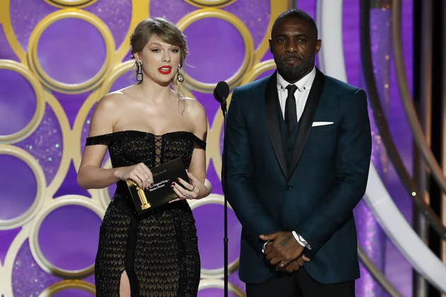 Taylor Swift Made a Surprise Appearance at the Golden Globes and Fans Were Confused