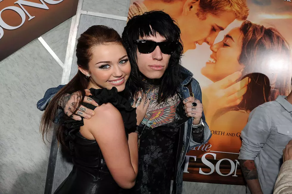 Trace Cyrus Attacks ‘Jealous’ Female Fans Over Photo of Him Choking Fiancee