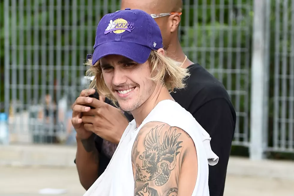 Justin Bieber Stops Car to Give Money to Homeless Man