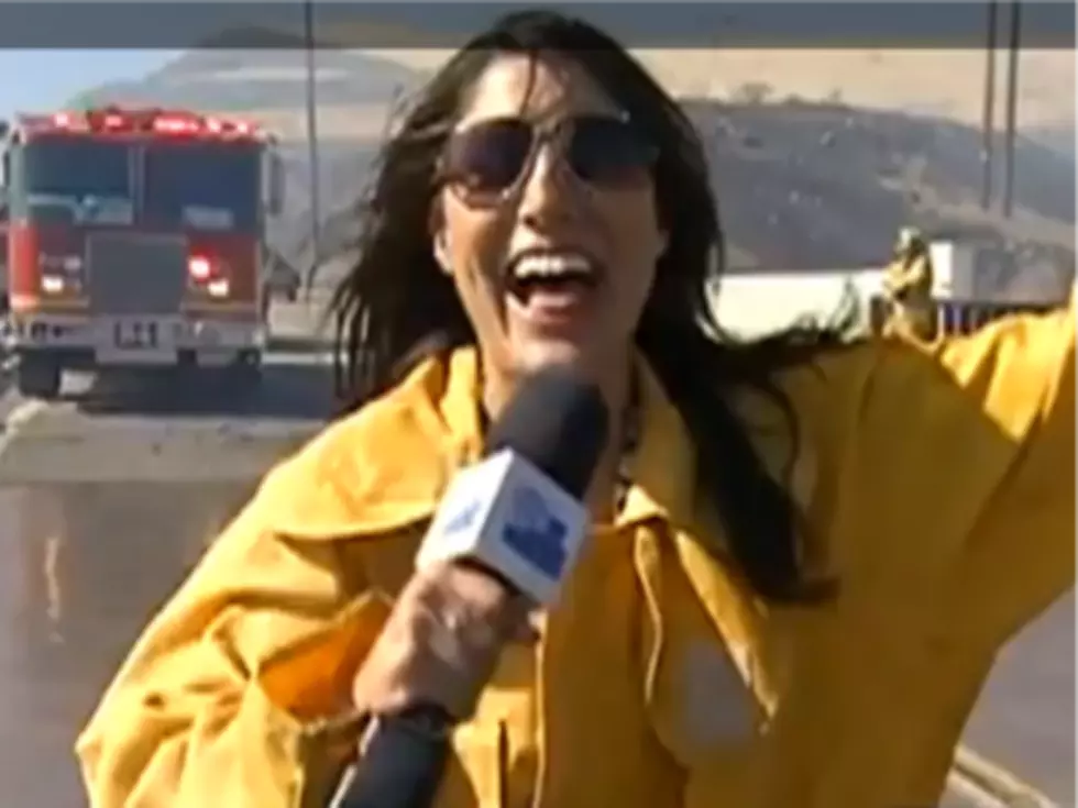 Reporter Soaked By Fire-Fighting Helicopter