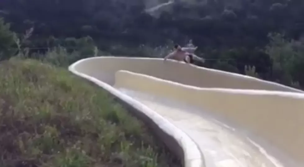 Man Shot Out Of Water Slide