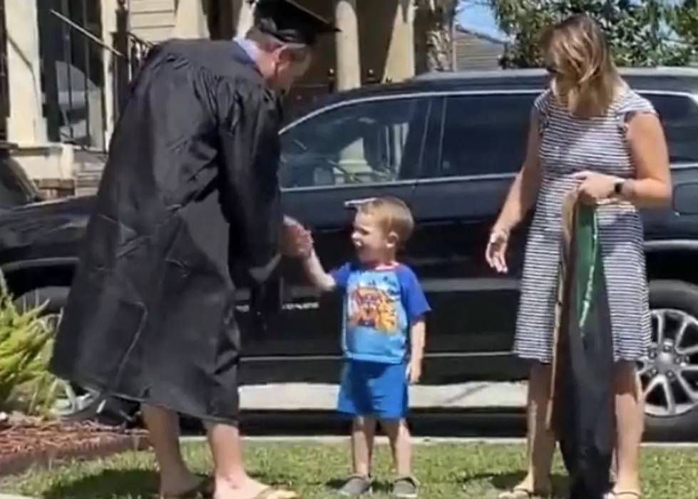 3-Year-Old Hands Dad Diploma In New Orleans Front Yard Ceremony