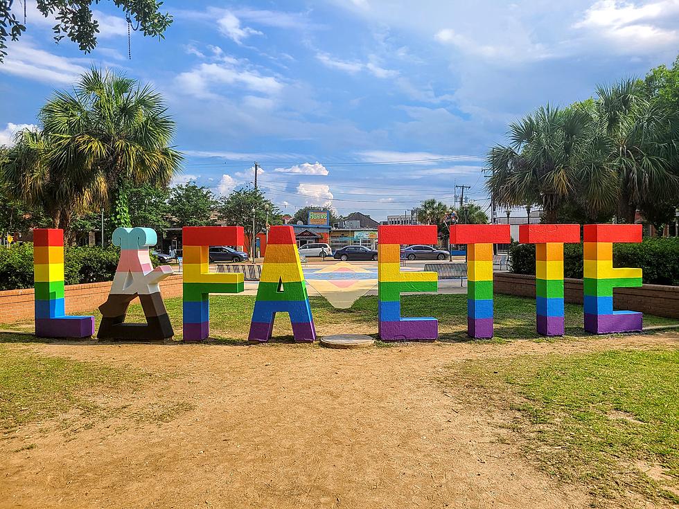 PFLAG Celebrates Diversity by Painting the LAFAYETTE Sign