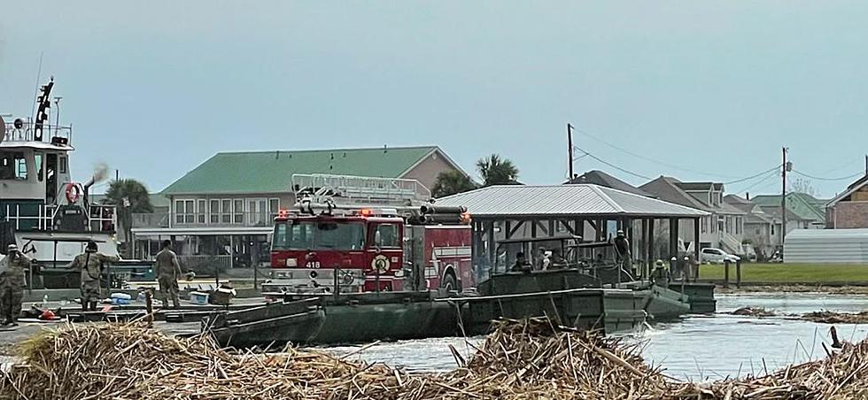 Louisiana National Guard Floats Firetrucks Across Bayou After Ida