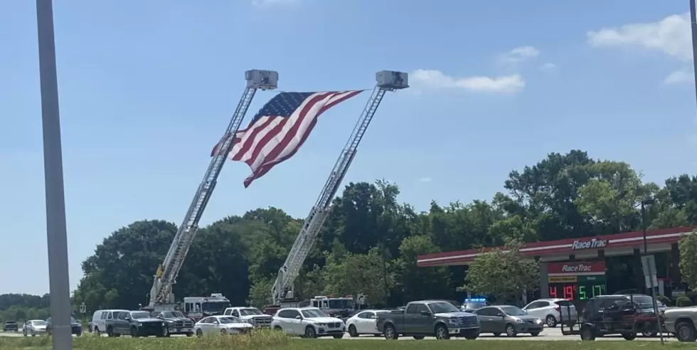 Broussard Firefighter Funeral: American Flag Over Ambassador Caf 