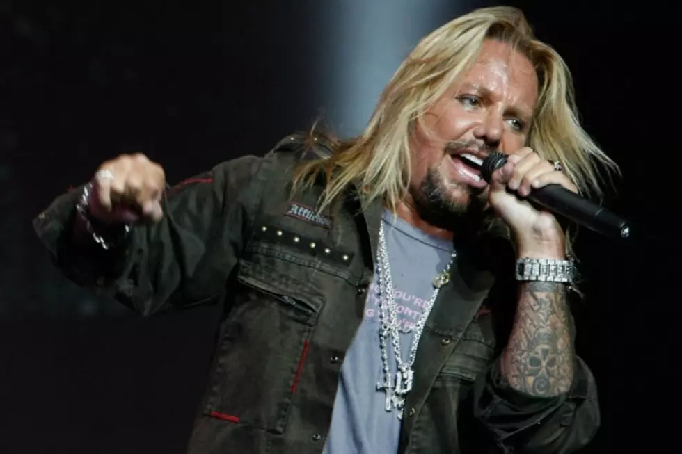 Vince Neil Mixes It Up with Unruly Fan During Concert