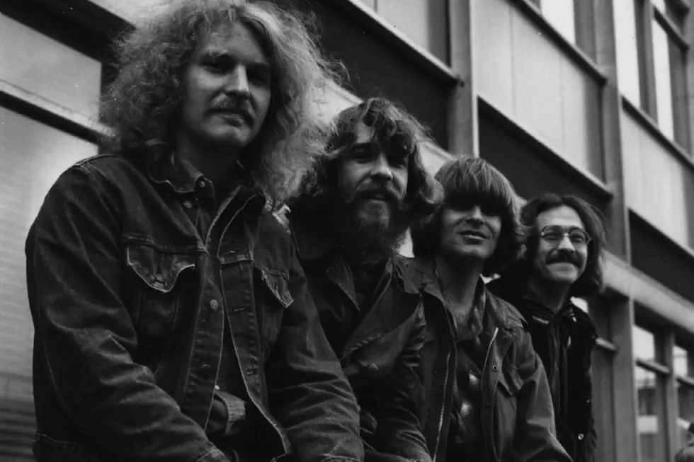 Ex-Creedence Clearwater Revival Bandmates Sue John Fogerty