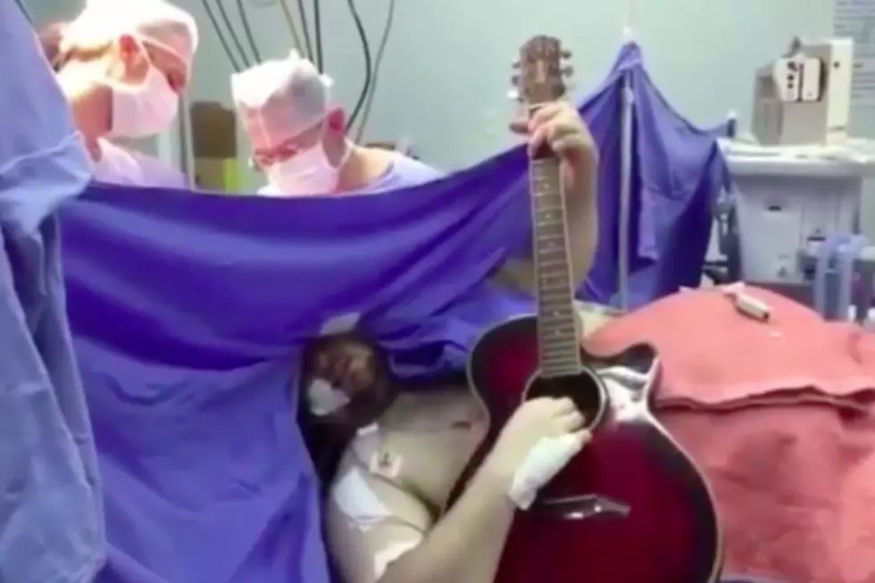 Watch a Man Play the Beatles on His Guitar While Undergoing Brain Surgery