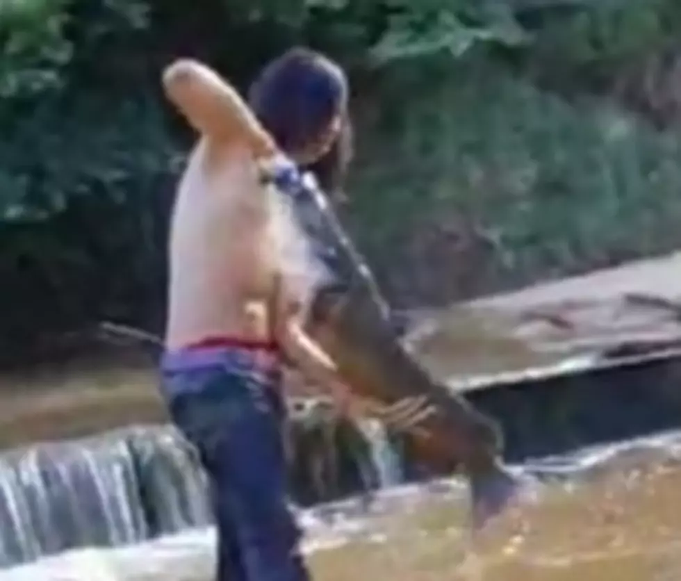 Noodling:Big Fish, Bare Arms, Breaking The Law [Video]