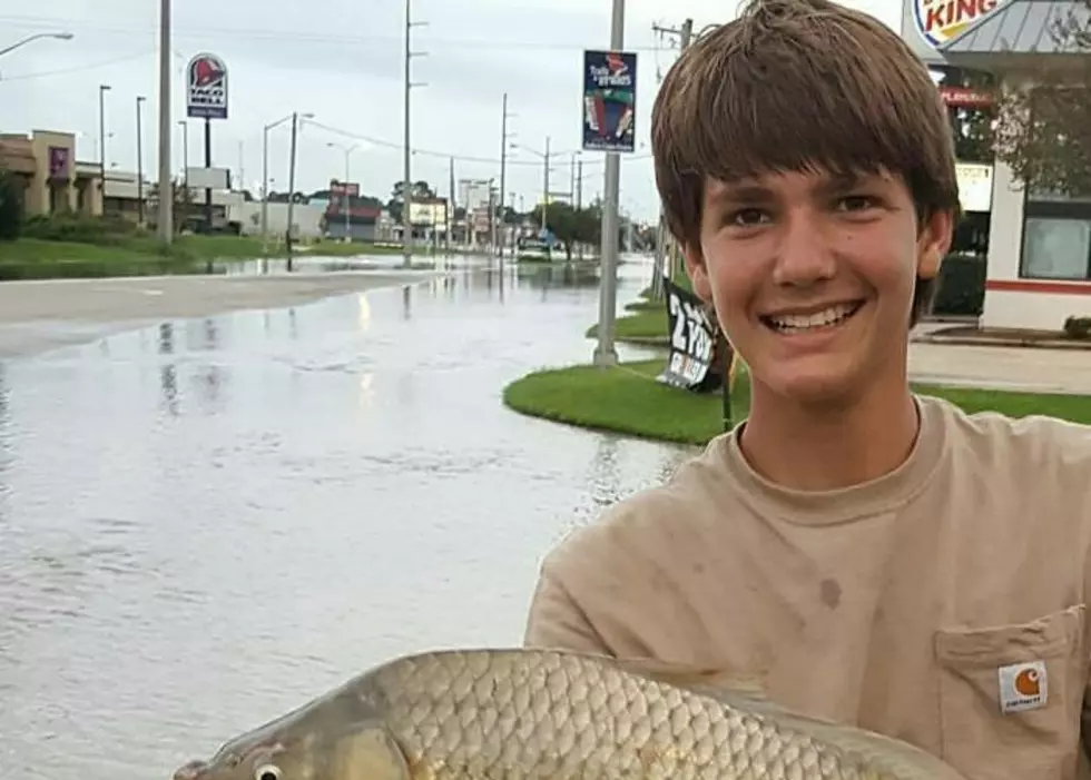 Man Catches A Big Ole Fish With His Hands On Main Street In Crowley [Pic]