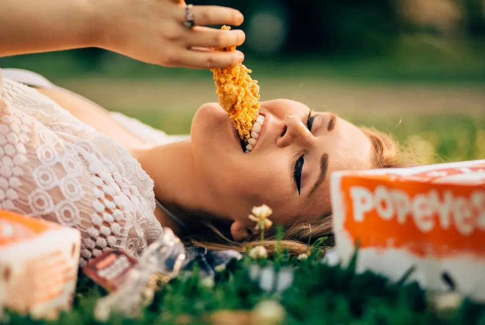New Orleans Woman Announces Her Engagement To A Box Of Popeyes Fried Chicken [Photos]
