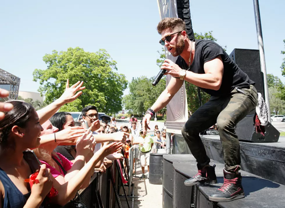 Chris Lane Falls on Stage, Bounces Back Like a Champ! [VIDEO]