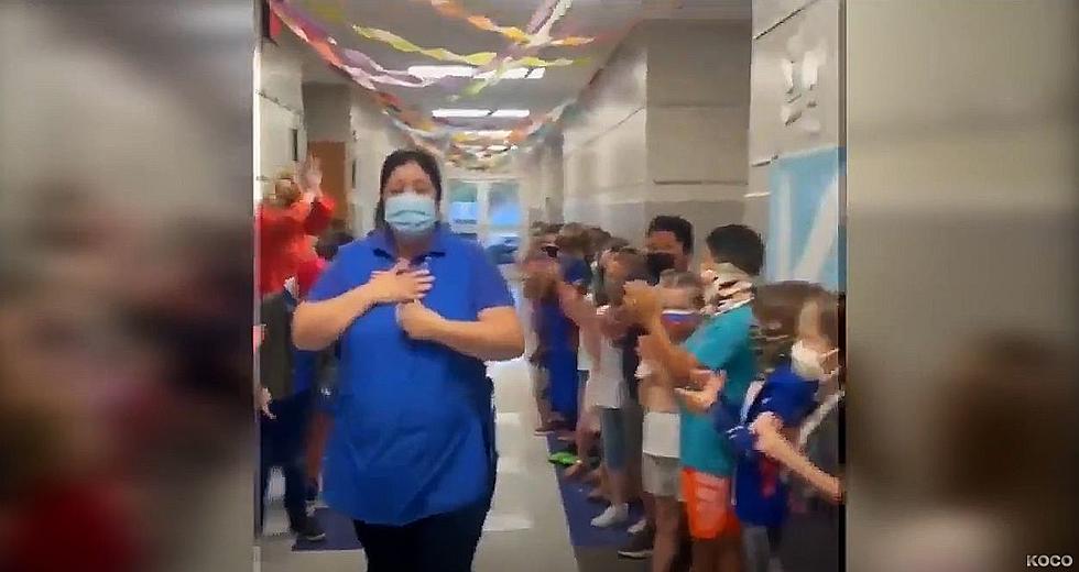 Watch Children Celebrate Cafeteria Manager Passing US Citizenship Test