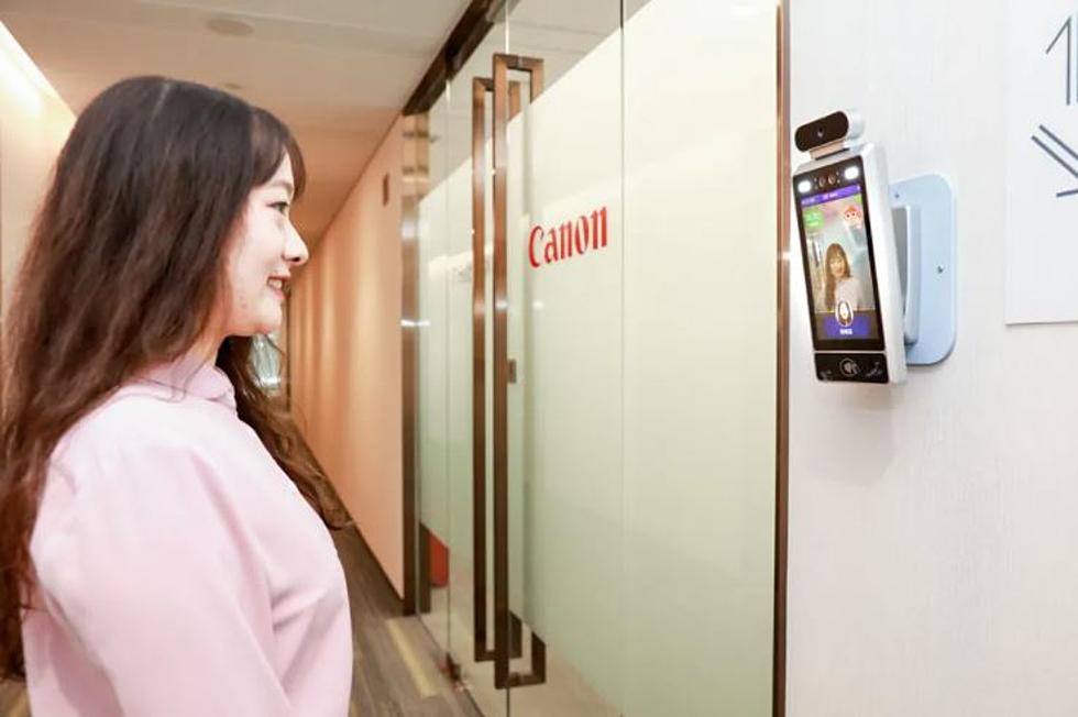 Cameras Force Workers to Smile Before Door Unlocks