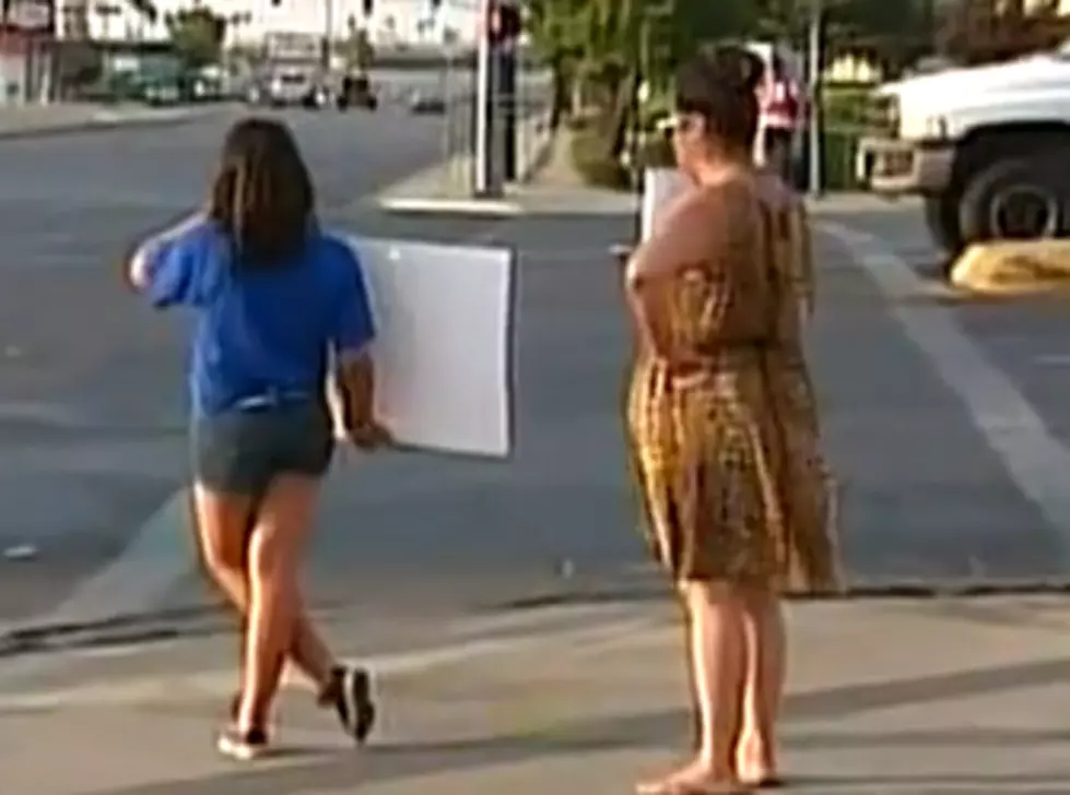 Mother Has Daughter Hold Up Sign At Intersection For Twerking At A School Dance [VIDEO]