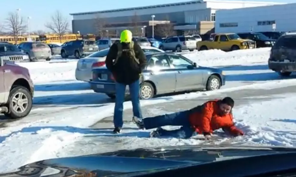 Insensitive Dad Laughs While He Films Kids Slipping On Ice [VIDEO]