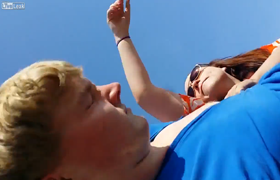 Woman Viciously Attacks Man For Flying Drone At Beach [VIDEO]