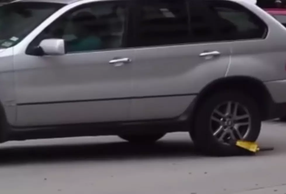 Woman Drives Off With ‘Boot’ On Car [VIDEO]