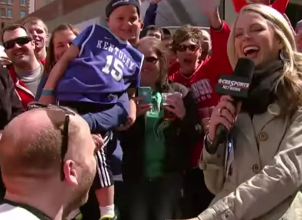 Michigan State Fan Proposes To CBS Sports Reporter [VIDEO]