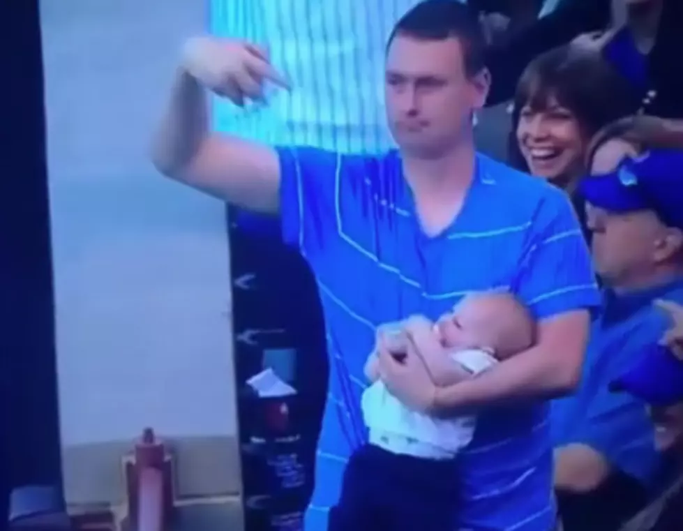 Fan Catches A Foul Ball While Feeding His Baby [VIDEO]