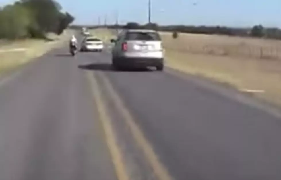 North Texas Driver Swerves and Hits Motorcycle Passing Him On Highway [VIDEO]
