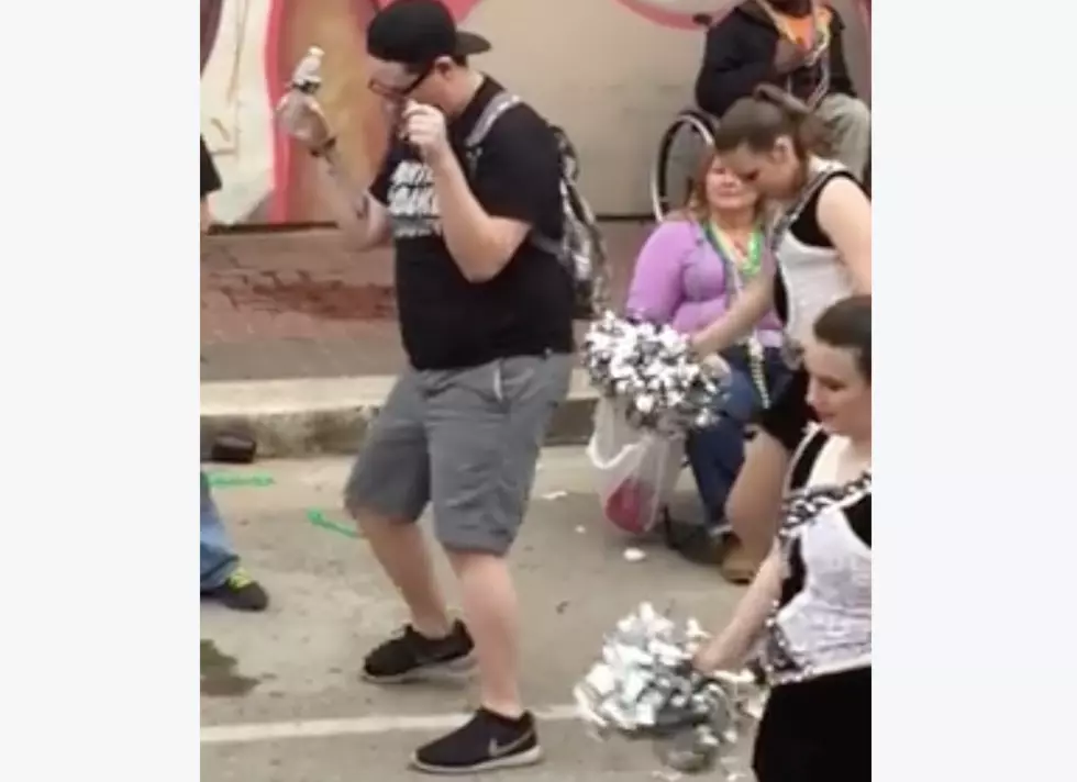 This Dance Team Chaperone Is Definitely In The Mardi Gras Spirit [VIDEO]