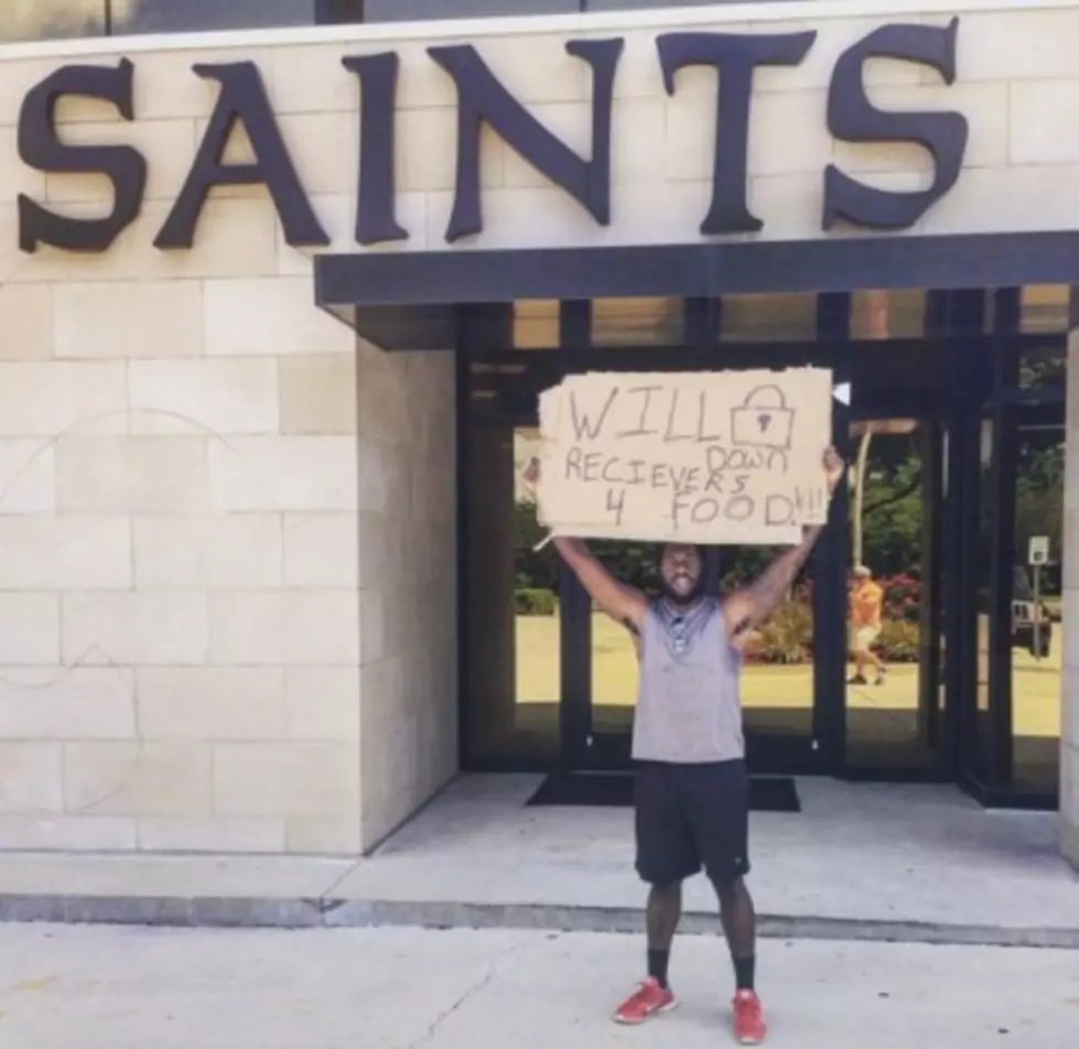 Man Stands In Front Of New Orleans Saints Facility With Cardboard Sign &#8216;Will Lockdown Receivers 4 Food&#8217;