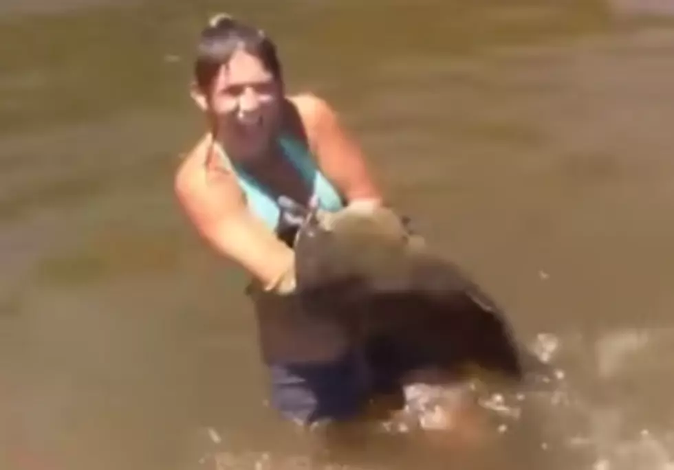 Girl Catches Catfish With Bare Hands [VIDEO]