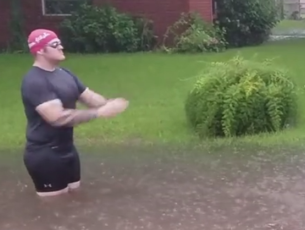 Man Takes A Swim In Flooded Ditch [VIDEO]