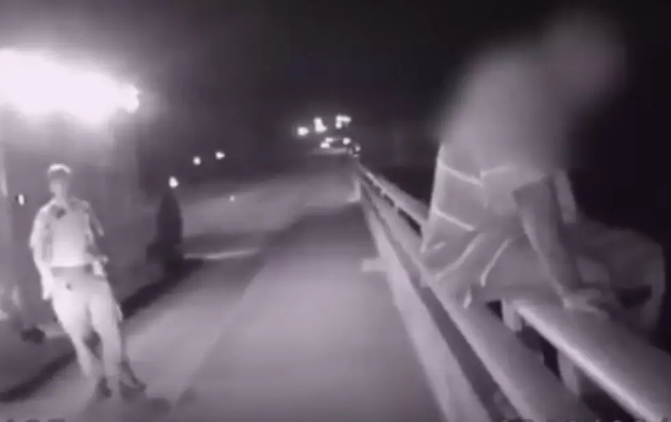 Cops Save Man From Jumping Off Bridge By Talking Football [VIDEO]