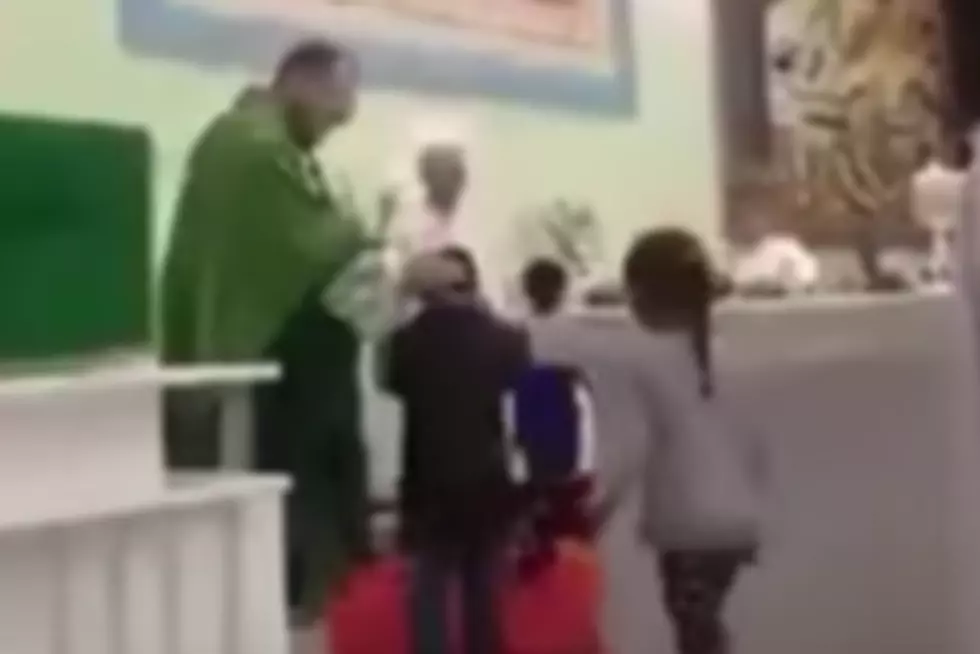 Priest Slaps And Shoves Kids As He ‘Blesses’ Them [VIDEO]