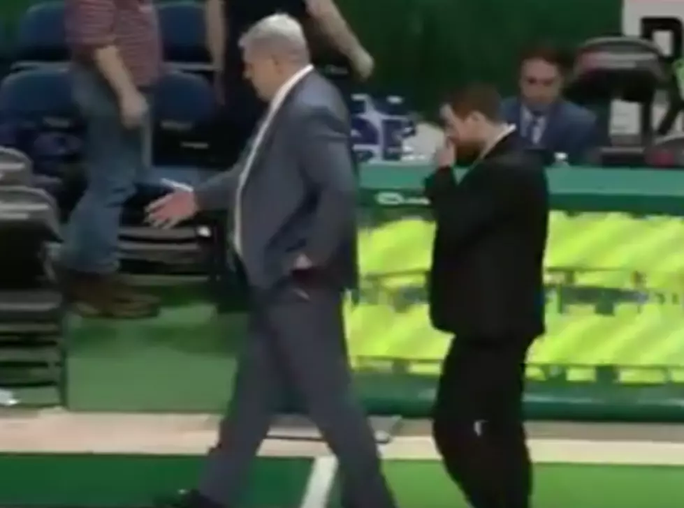 Basketball Coach Shakes Hands With Invisible Team [VIDEO]