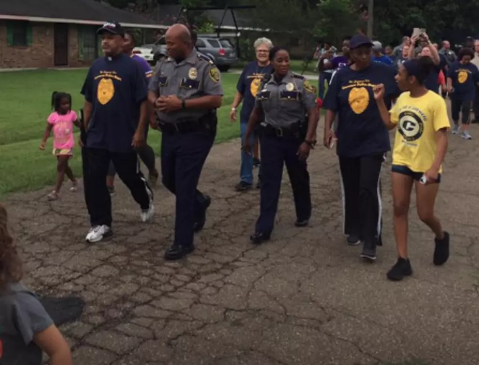 Carencro Police Hit The Streets And Walk Hand-In-Hand With Citizens