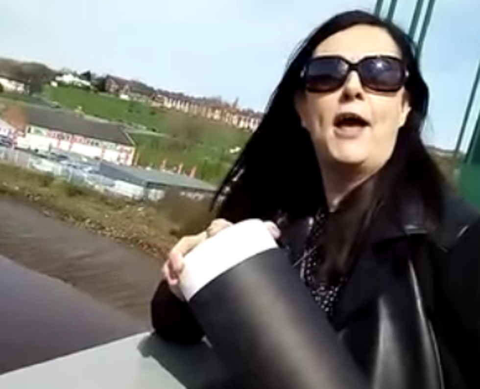 Woman Attempts To Dump Mother’s Ashes Off Bridge [VIDEO]