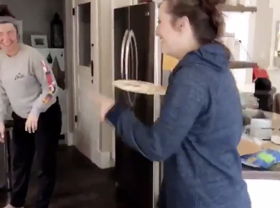 Woman Throws Frozen Pizza Into Oven [VIDEO]