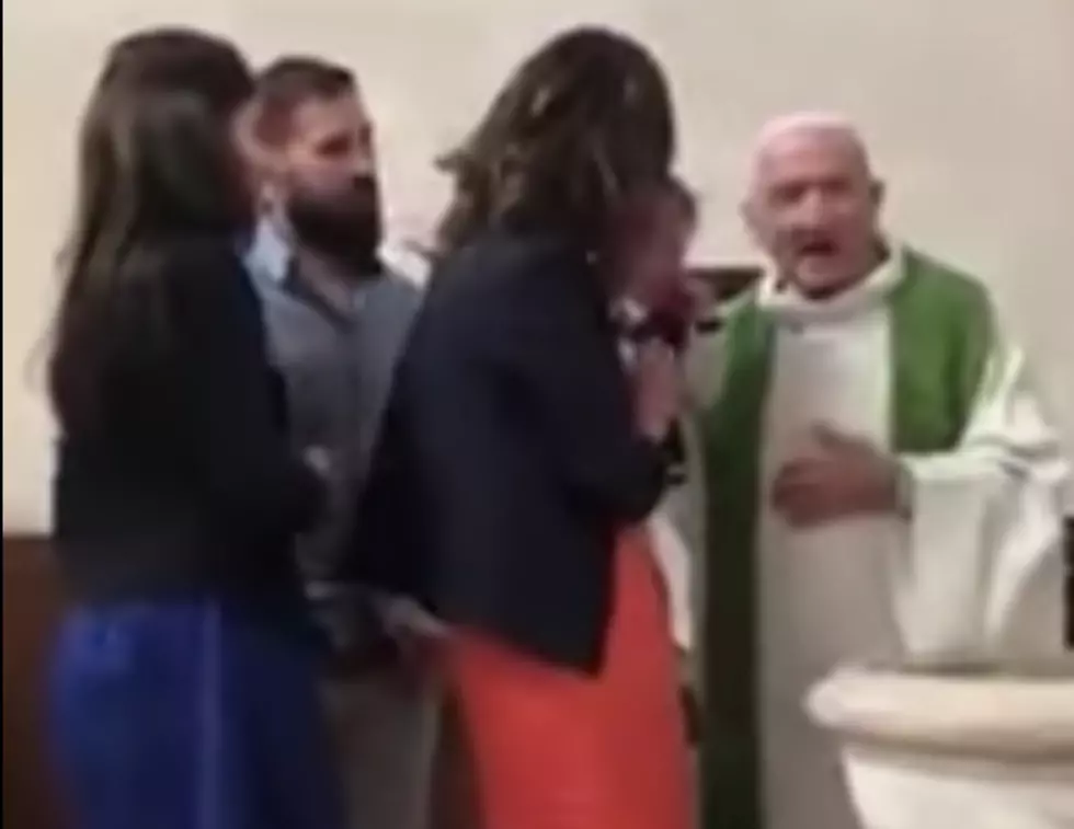 Priest Slaps Crying Baby During Baptism [VIDEO]