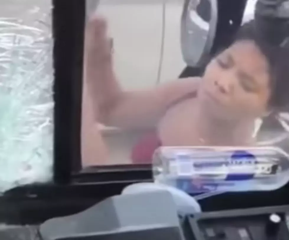 Woman Smashes Window of Bus, Then Runs Over Driver [VIDEO]