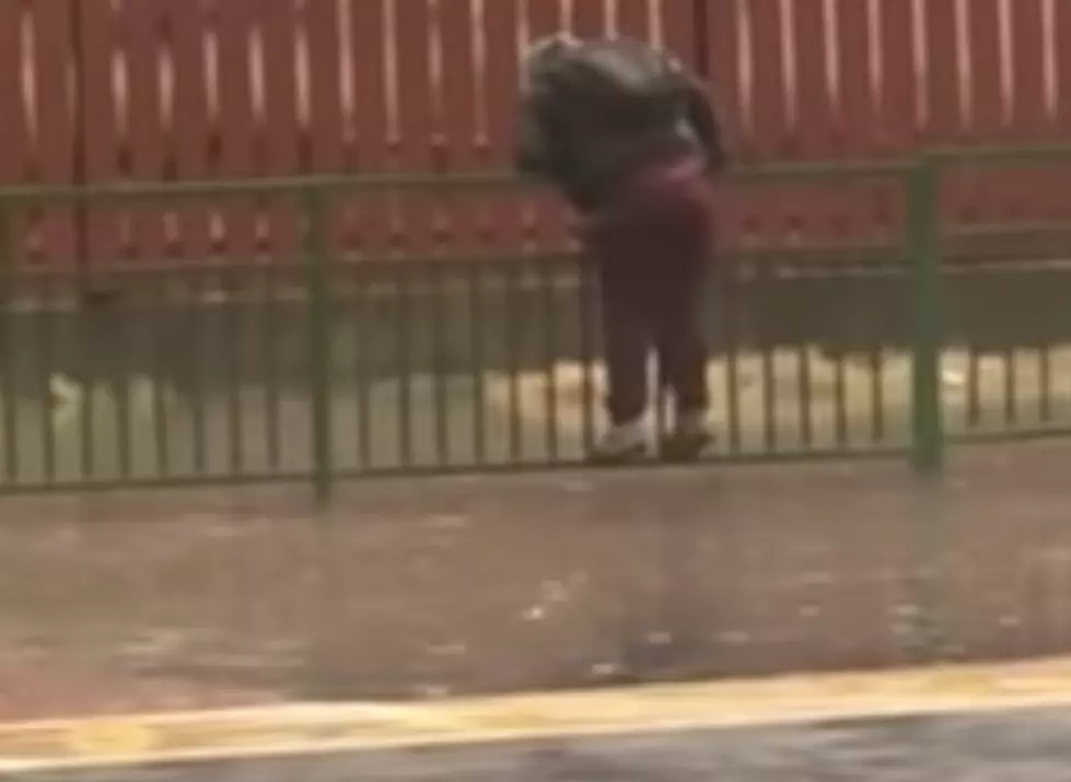 Kid Avoids Water Puddle, Then Gets Splashed By Car [VIDEO]