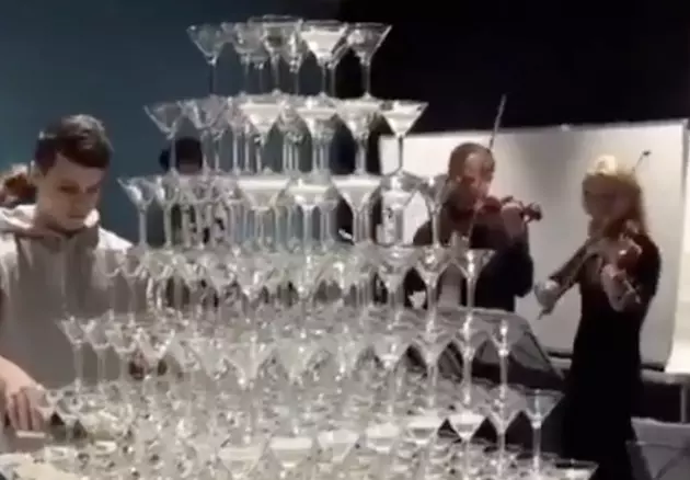 Pyramid Of Champagne Glasses Comes Toppling Down [VIDEO]