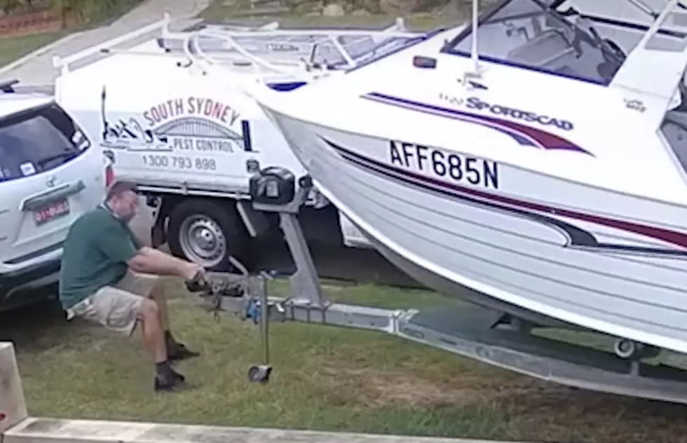 Man Holds Onto Boat For Dear Life [VIDEO]