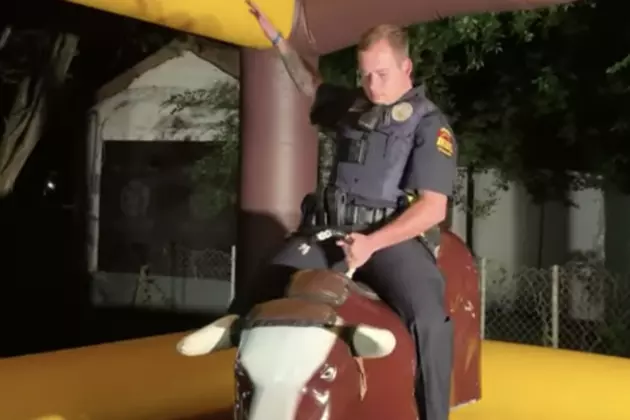 Police Officer Rides Mechanical Bull After Being Called Out To Residence [VIDEO]