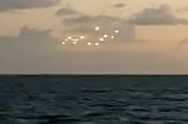 Did This Man Spot UFOs Over The Water? [VIDEO]