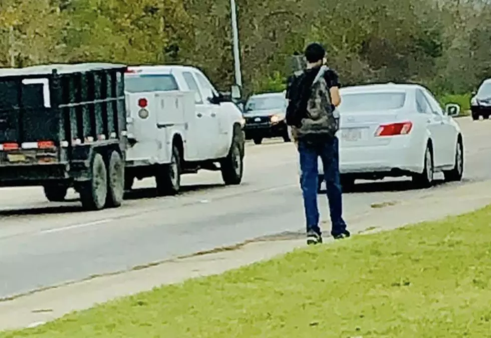 Viral Photo Shows Lafayette Man Making Long Walk To Work [PHOTOS]