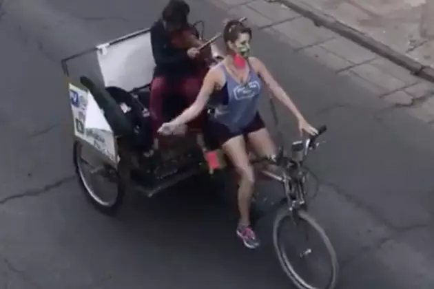 New Orleans Musician and Pedicab Driver Serenade French Quarter Residents [VIDEO]