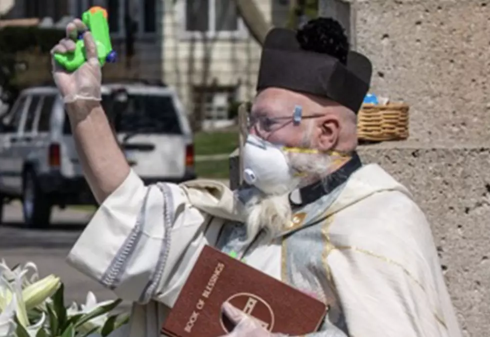 Priest Uses Water Gun To Bless Parishioners With ‘Holy Water’