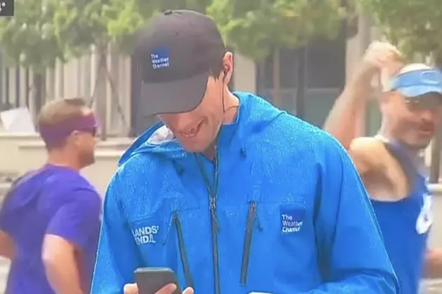 Two Men in Lafayette Jog Past Weather Channel Reporter [VIDEO]