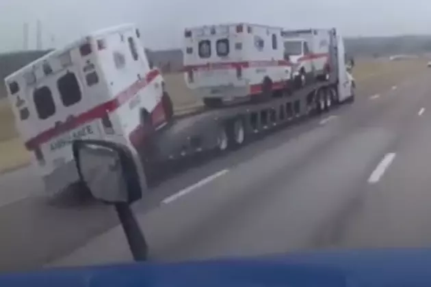 Watch As an Ambulance Falls Off A Transport Trailer [VIDEO]