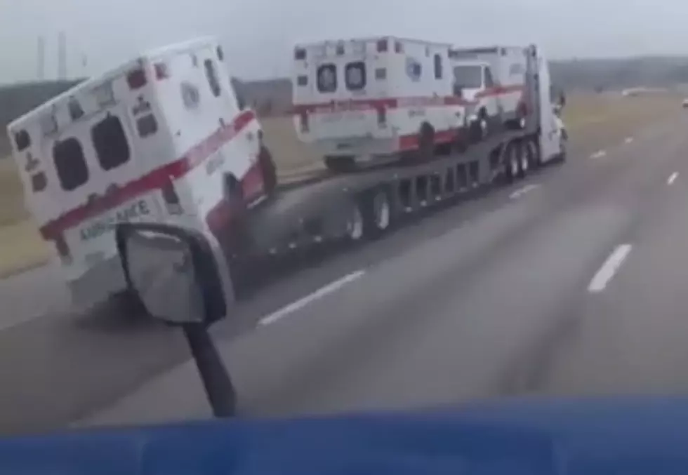 Watch As an Ambulance Falls Off A Transport Trailer [VIDEO]