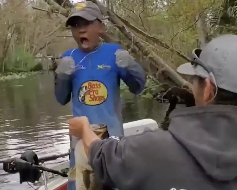Young Boy Loses It After He Catches Huge Fish [VIDEO]
